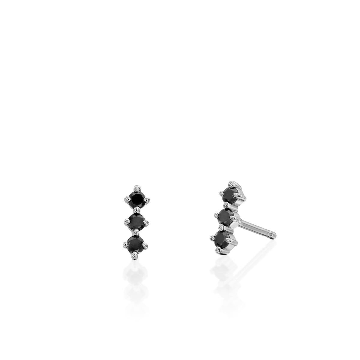 Tight gold earrings set with 3 black diamonds