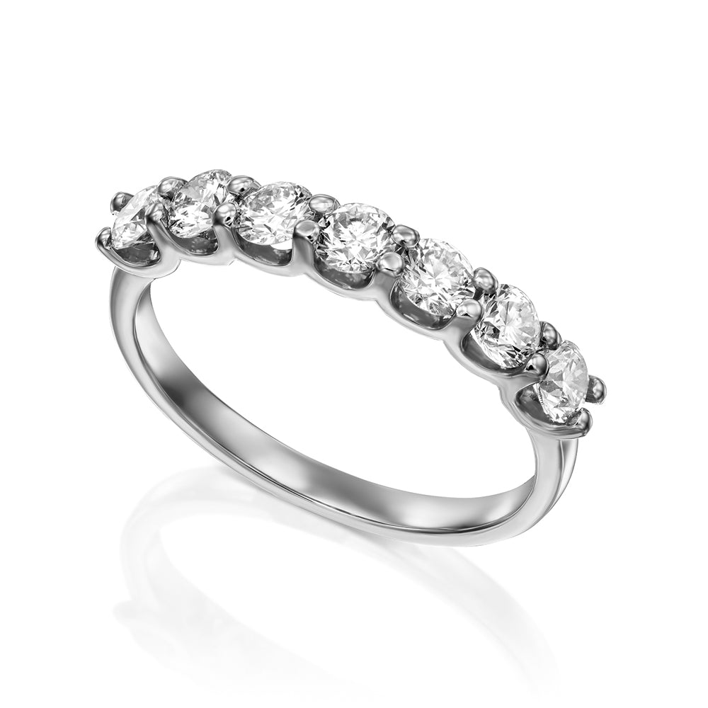 Gold ring with 7 diamonds weighing 15 points per diamond