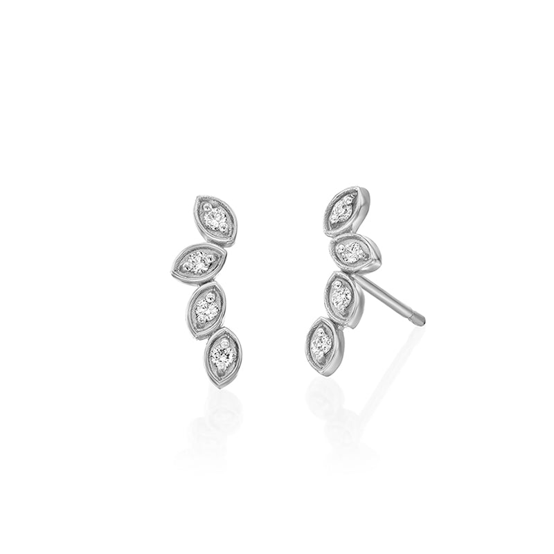 Climbing gold earrings in the shape of four leaves, set with diamonds