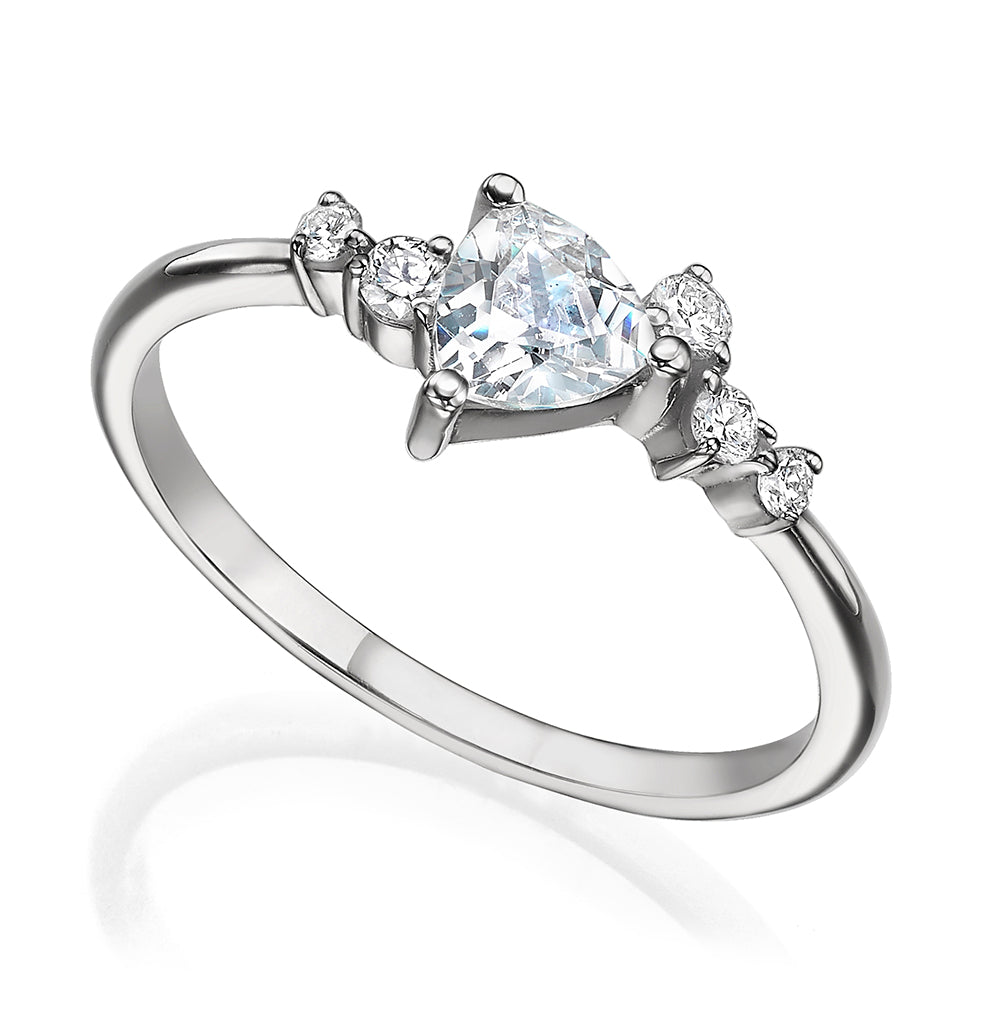 An engagement ring set with a trillion-cut diamond and diamonds all around
