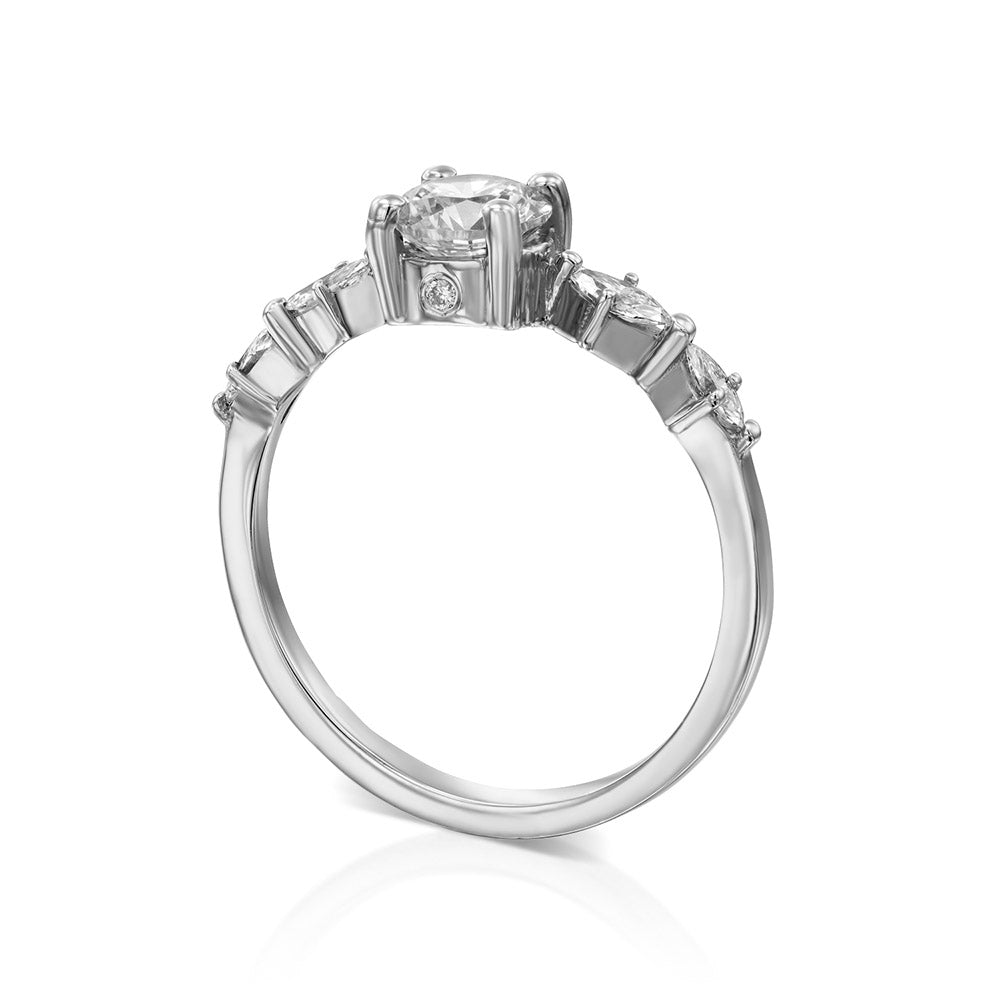Engagement ring set with a central round lab diamond 0.60 carat and marquise lab diamonds