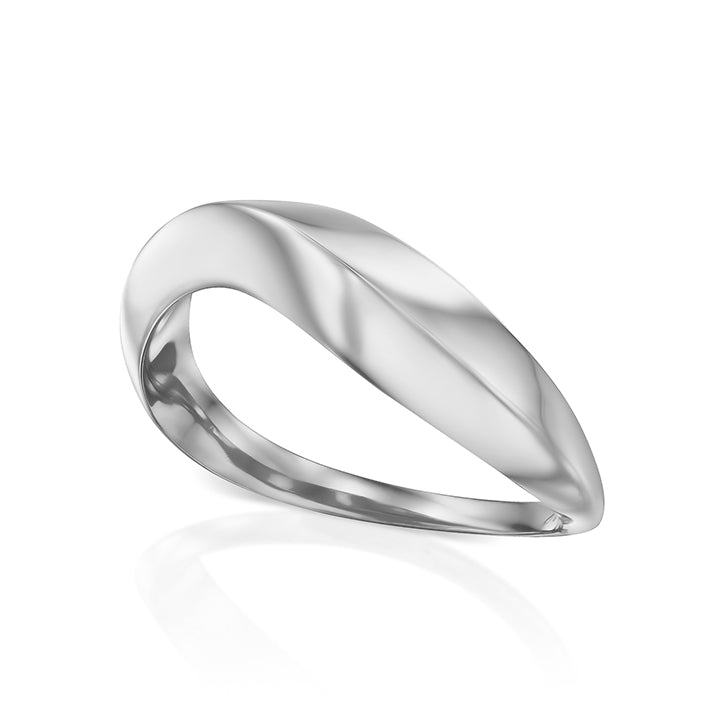 A thick geometric wave-shaped gold ring