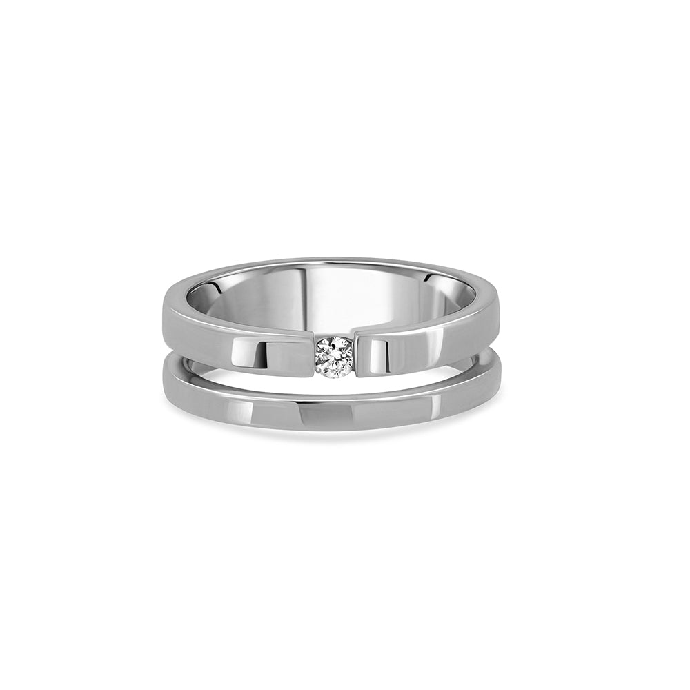 A double gold ring set with a round diamond weighing 5 points