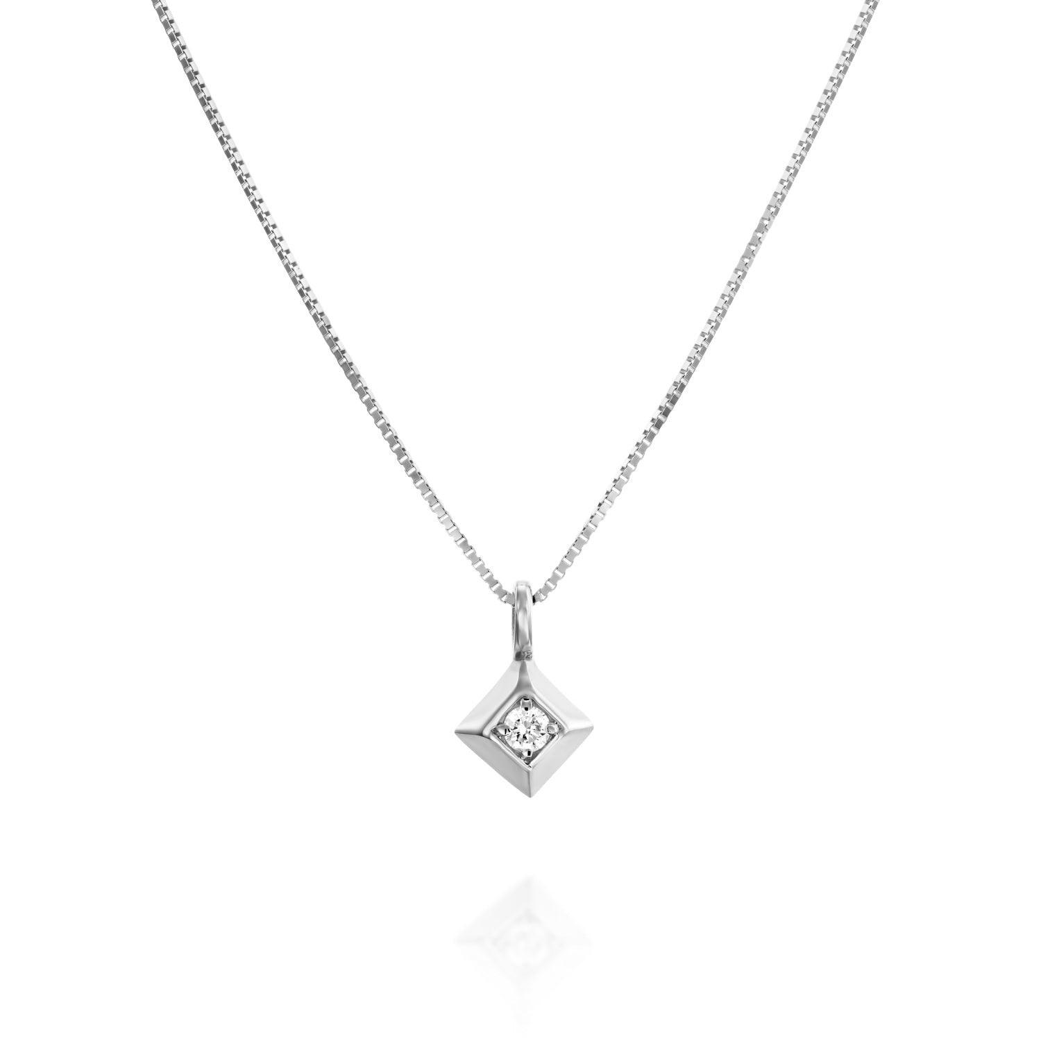 A delicate gold chain with a large square pendant and a 4-point diamond in the center