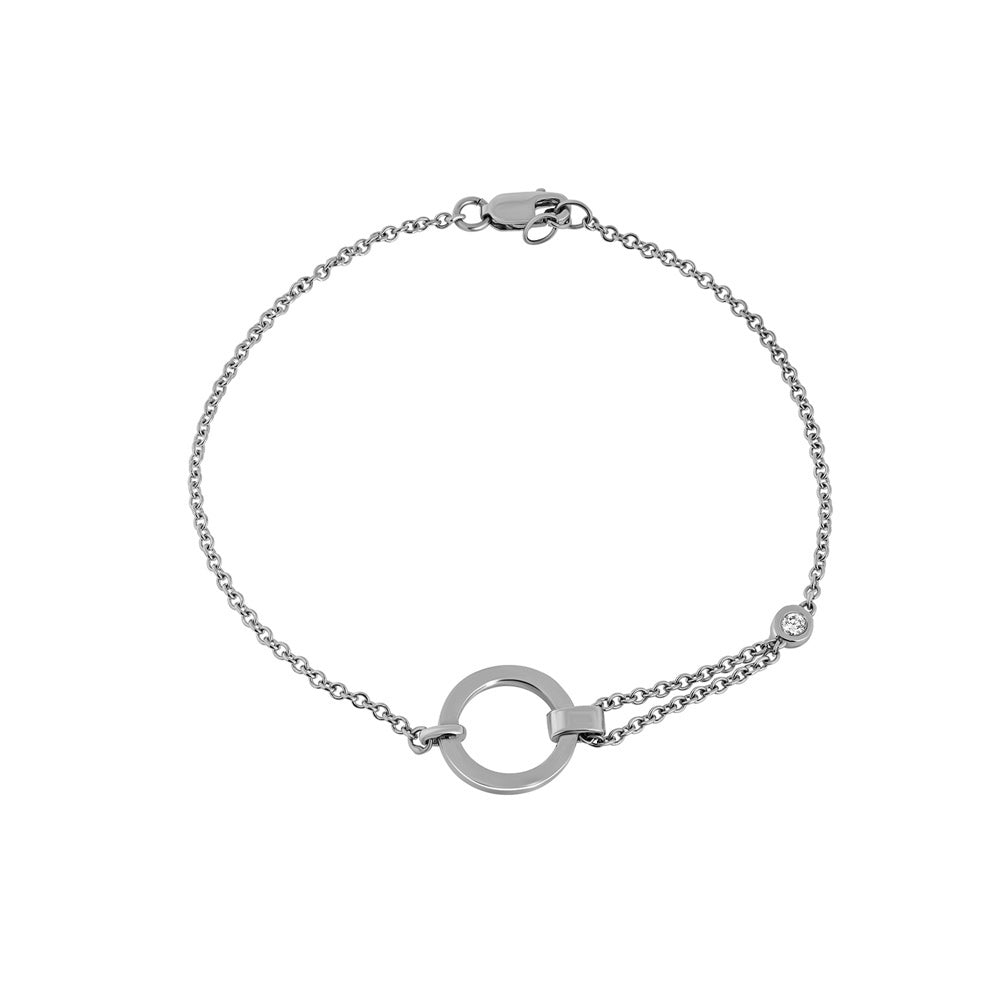 A special asymmetric gold bracelet in a modern and impressive design set with a diamond