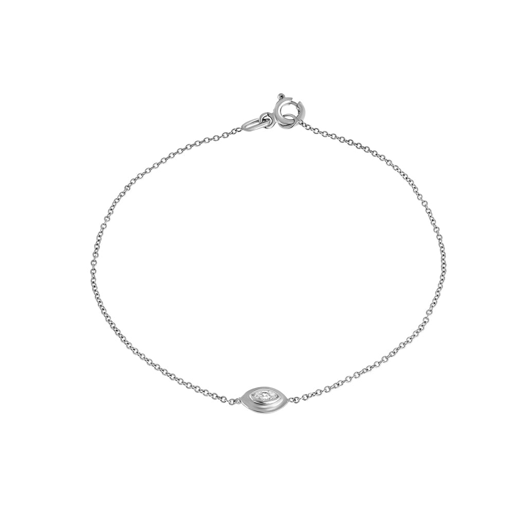 A delicate gold bracelet in the modern Ein Hare style, set with a marquise-cut natural diamond