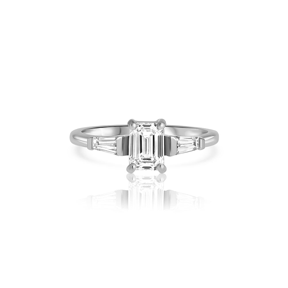 Engagement ring set with laboratory diamonds, emerald cut in an unforgettable design