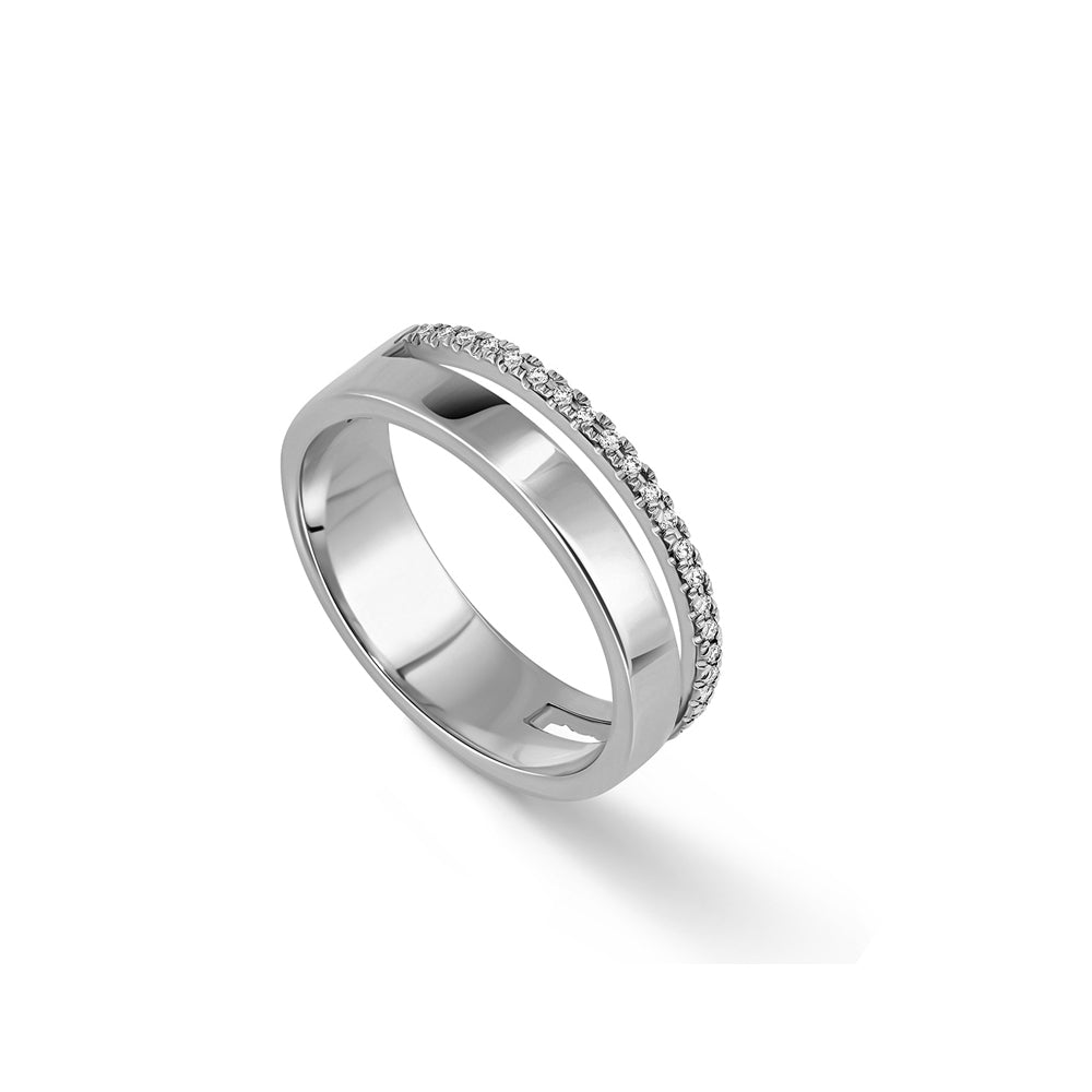 A double gold ring set with a row of diamonds and a smooth wide band
