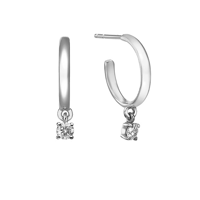 Gold hoop earrings with 20 point diamonds inlaid with teeth