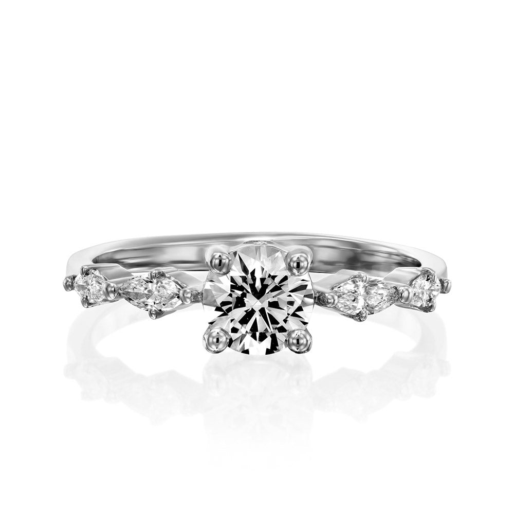 Engagement ring set with a central round diamond 0.60 carat and marquise diamonds