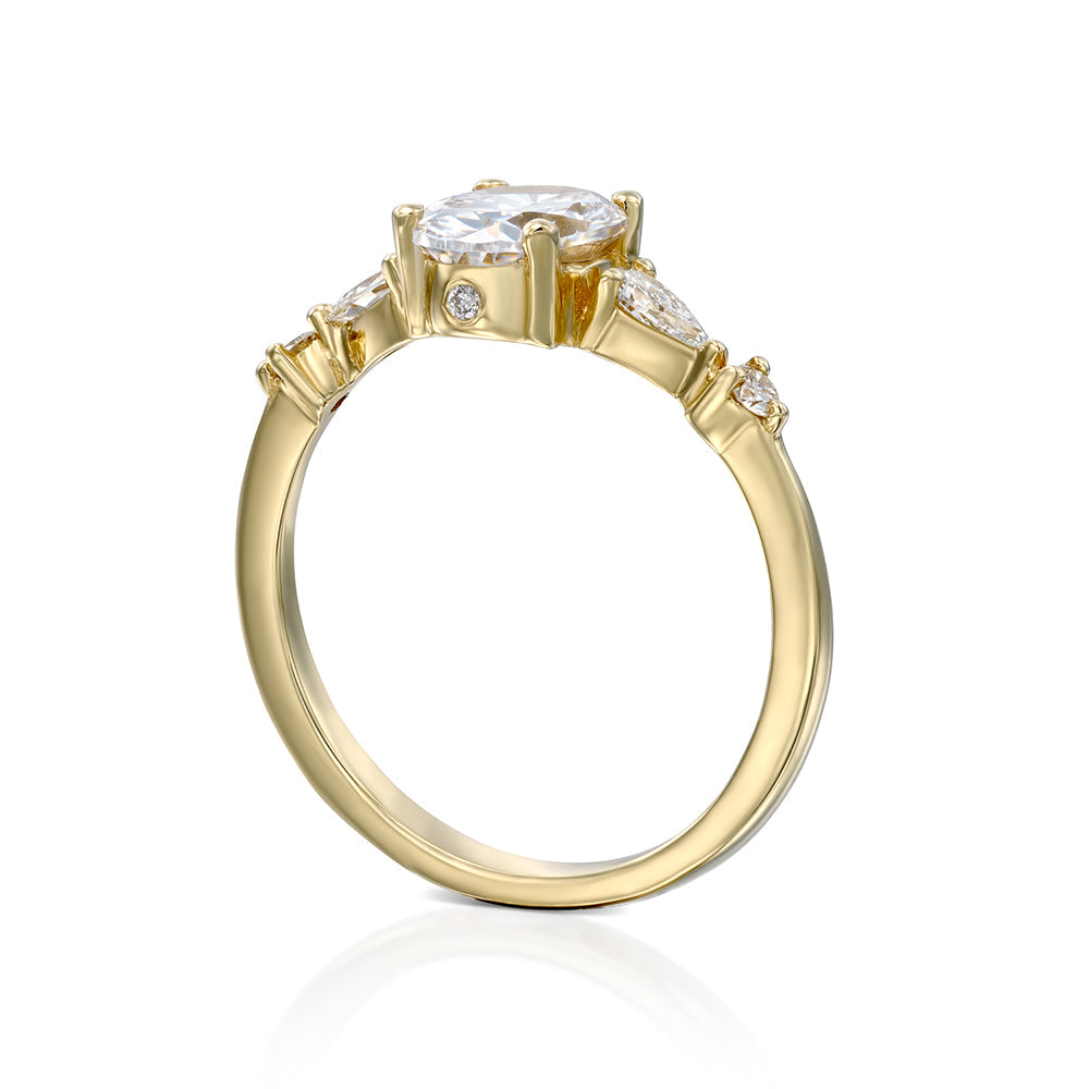 1.00 carat diamond ring combined with drop cut diamonds and round diamonds