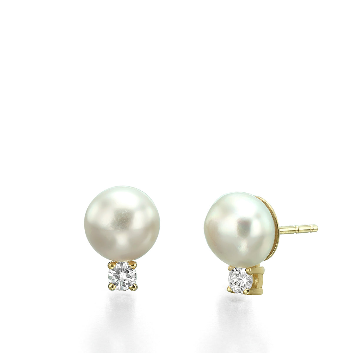 Large attached pearl and diamond earrings