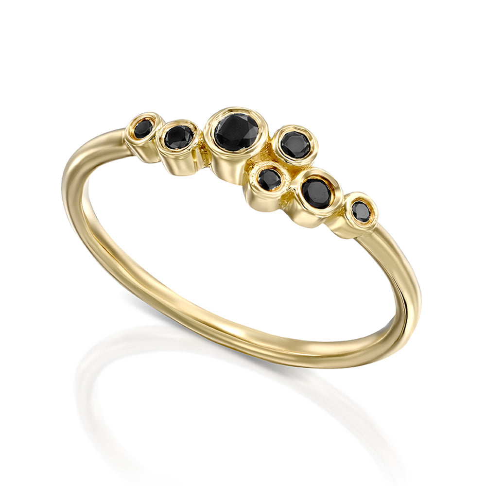 Black diamond ring of varying sizes in a cup setting