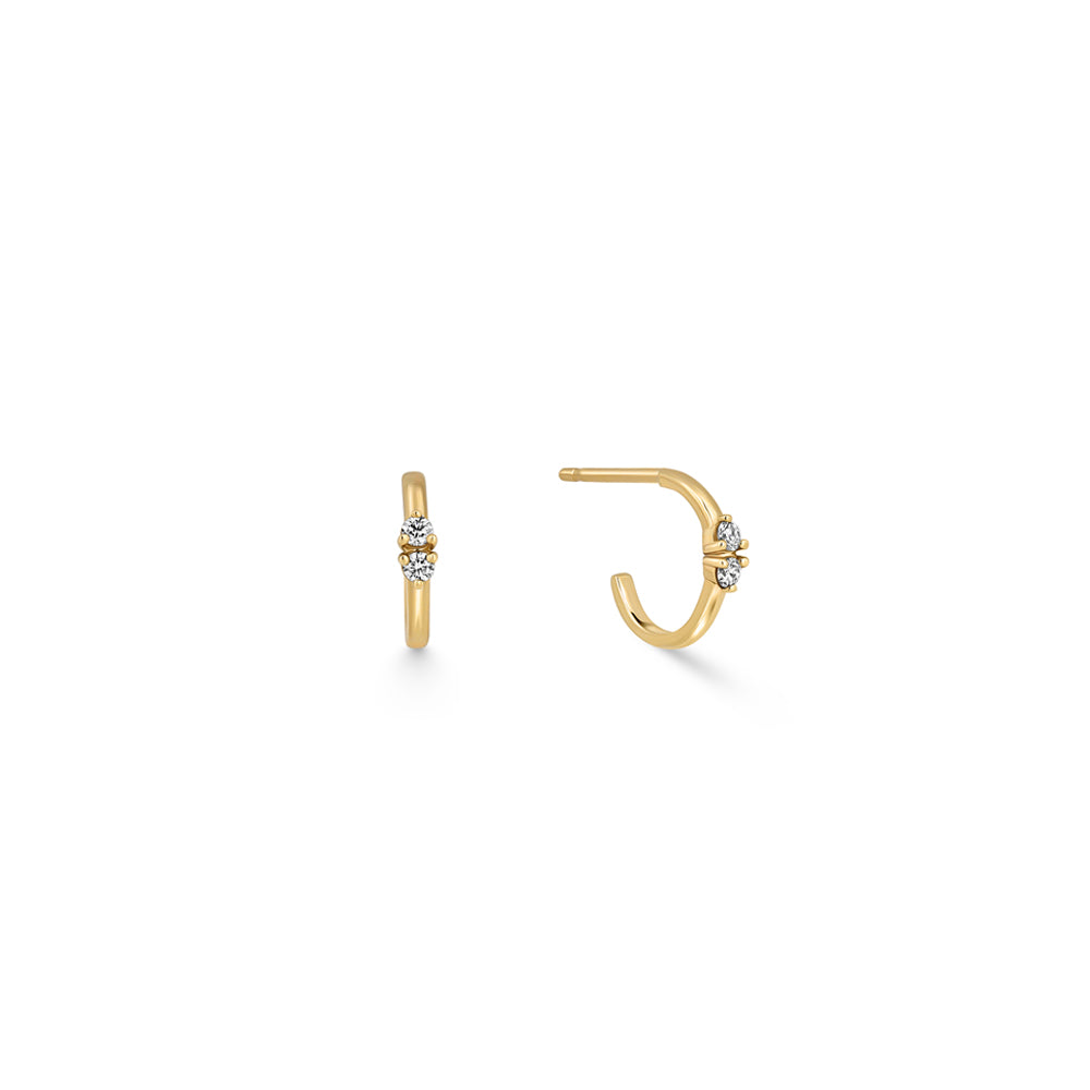 Small gold hoop earrings set with 2 diamonds