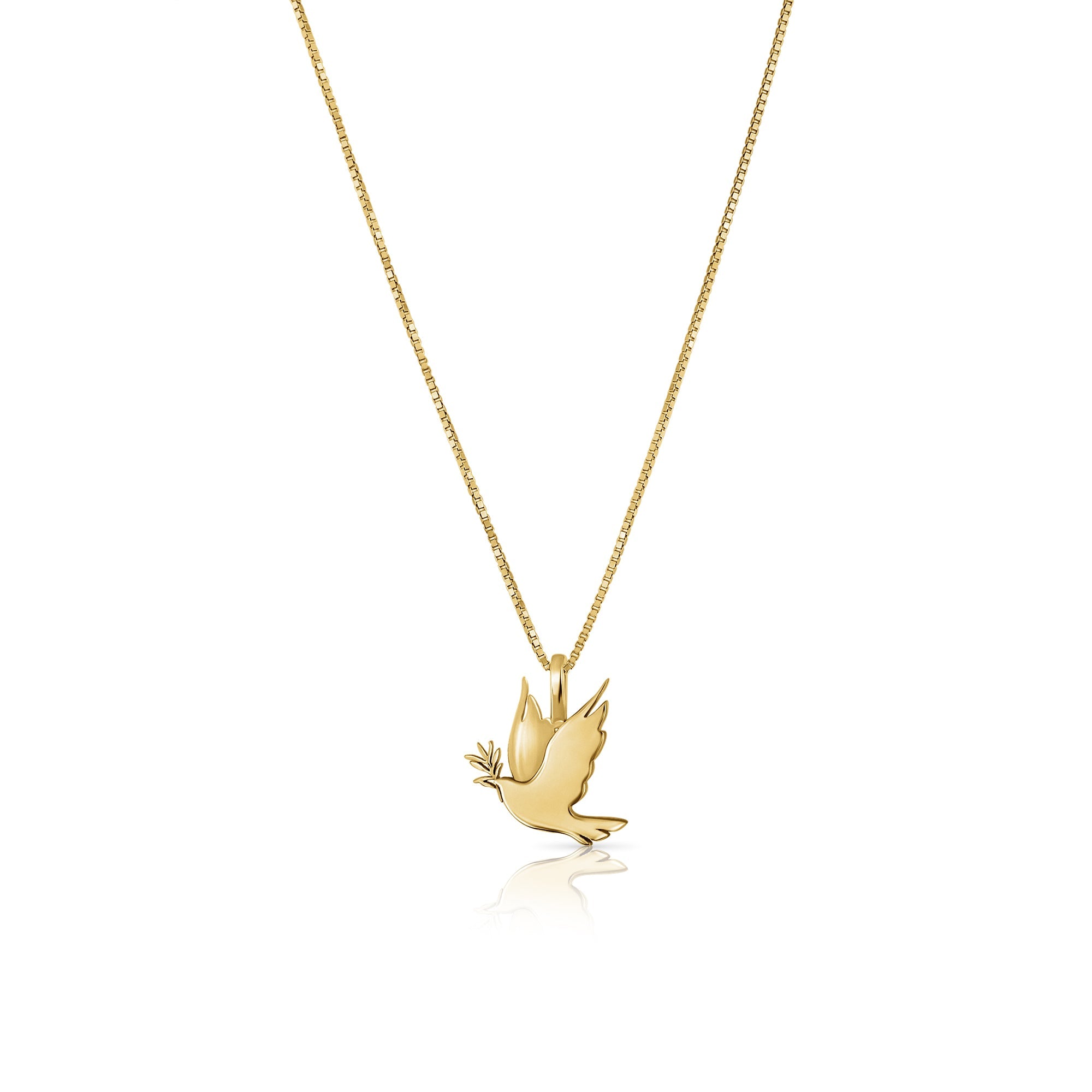 A gold necklace with a dove of peace pendant and an olive leaf