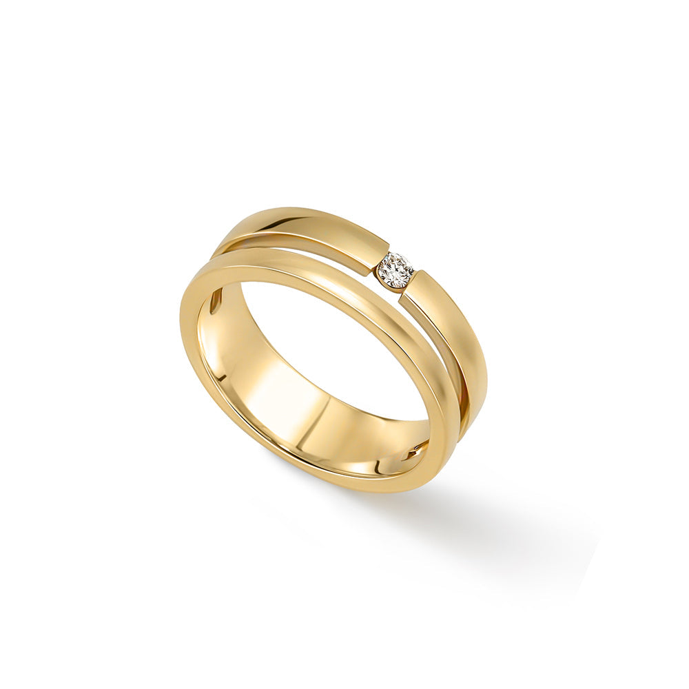 A double gold ring set with a round diamond weighing 5 points