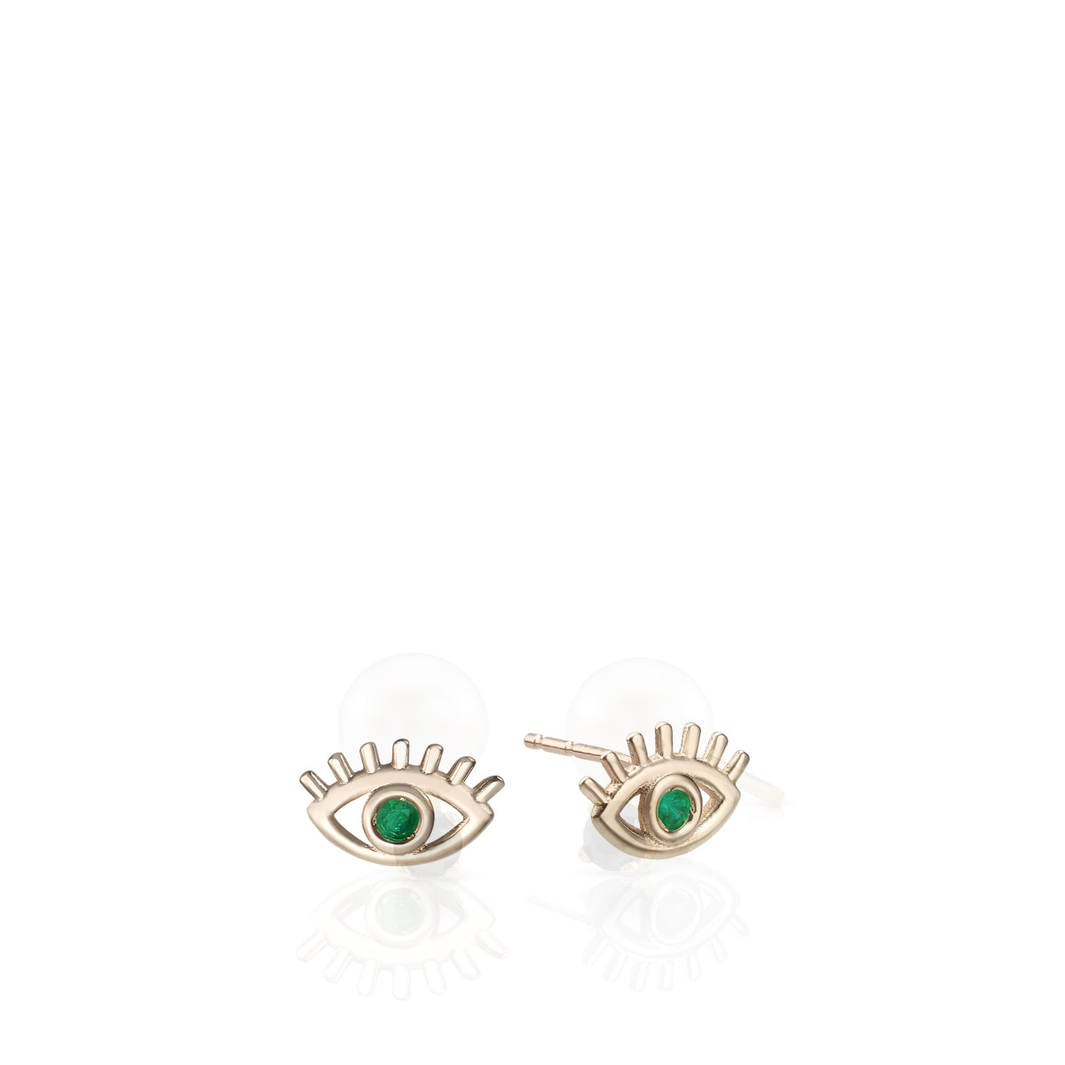 Gold studded earrings in a design against the evil eye, studded with emerald stones