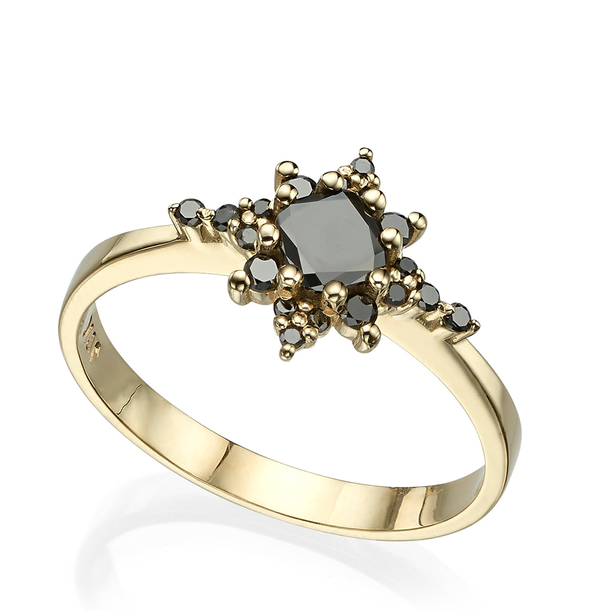 A black diamond star ring, with a central brilliant cut diamond
