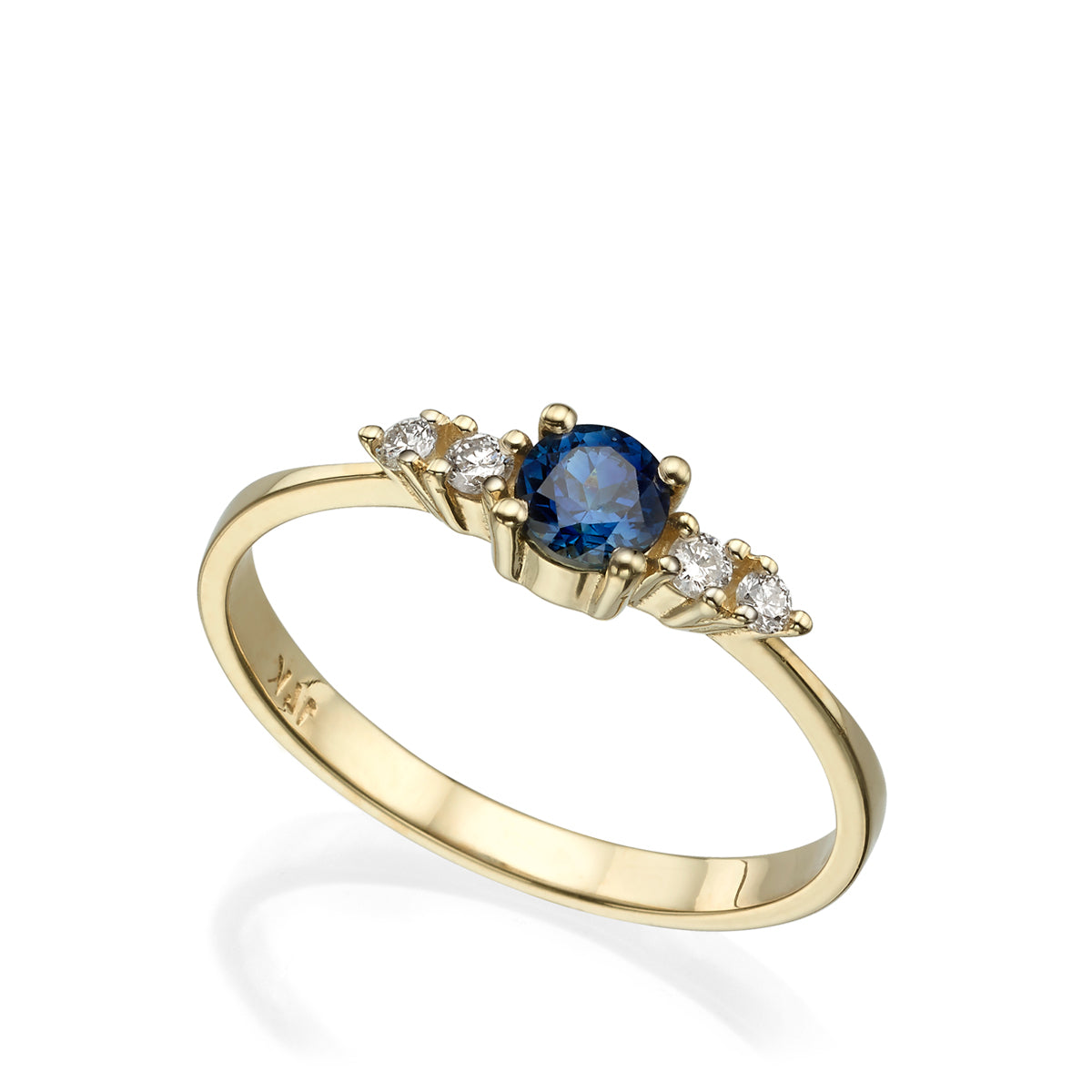 Delicate and special engagement ring set with sapphires and diamonds