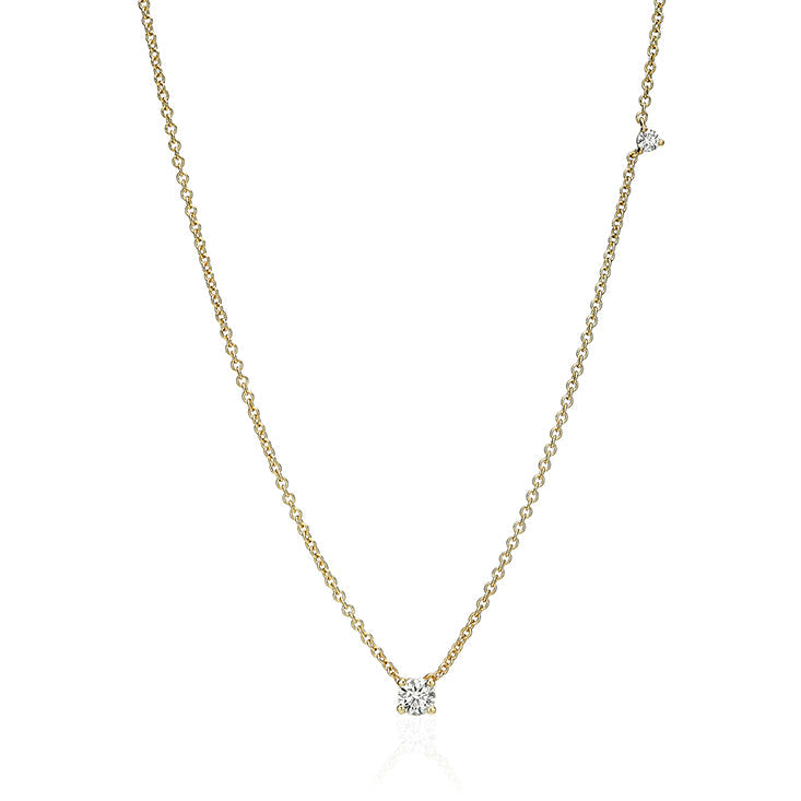 Gold chain set with a 20-point floating diamond and a round diamond on the side