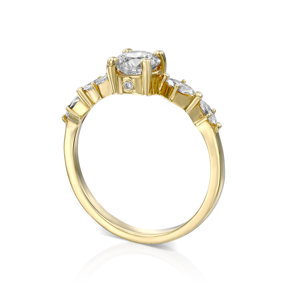 Engagement ring set with a central round diamond 0.60 carat and marquise diamonds