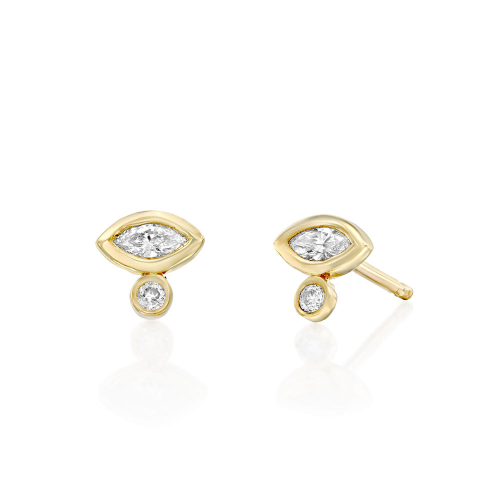 A single (!) special close-fitting earring set with a marquise-cut natural diamond (7 points) and a round-cut natural diamond with a ruby setting
