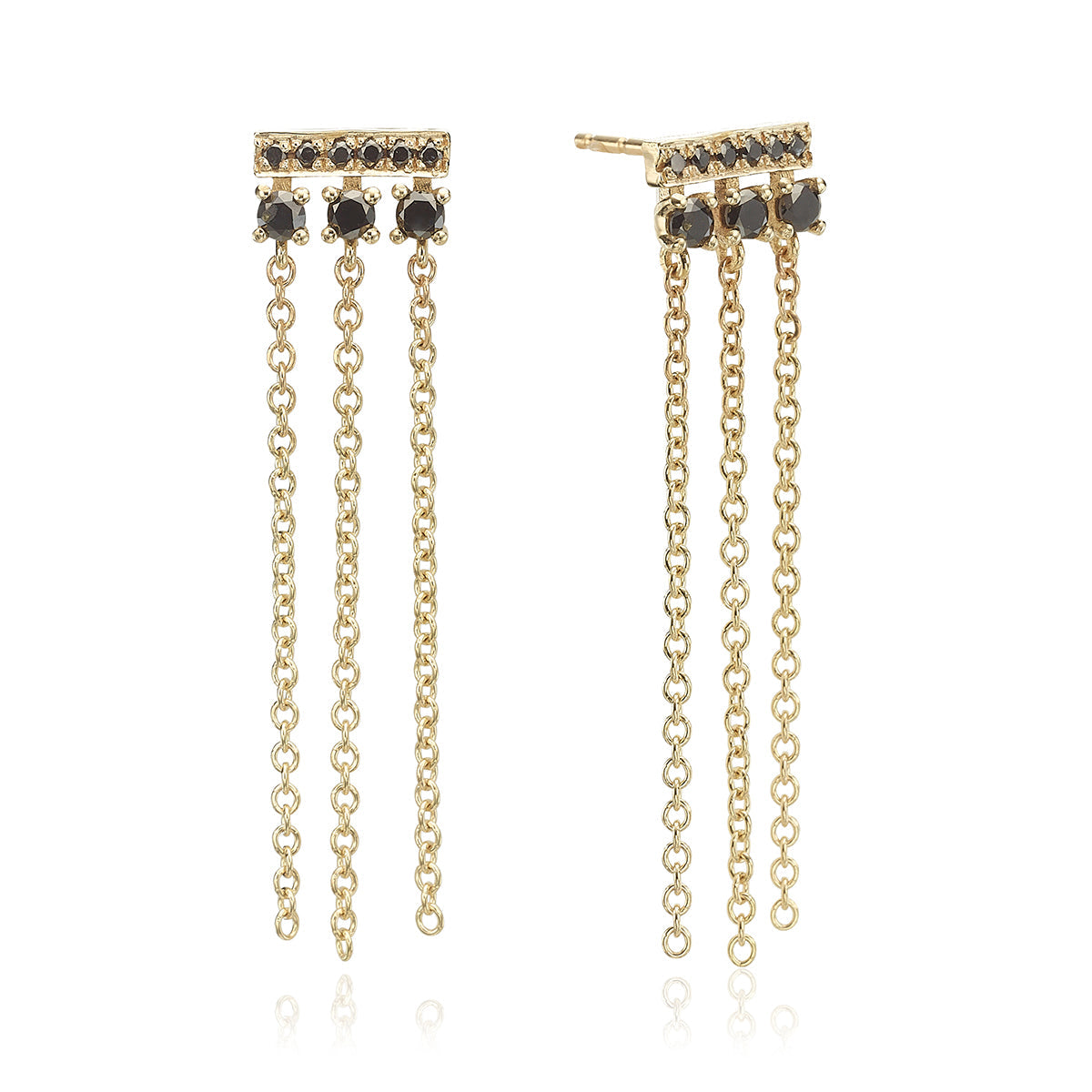 Special gold and black diamond earrings combined with swinging necklaces