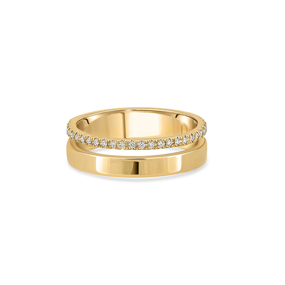 A double gold ring set with a row of diamonds and a smooth wide band