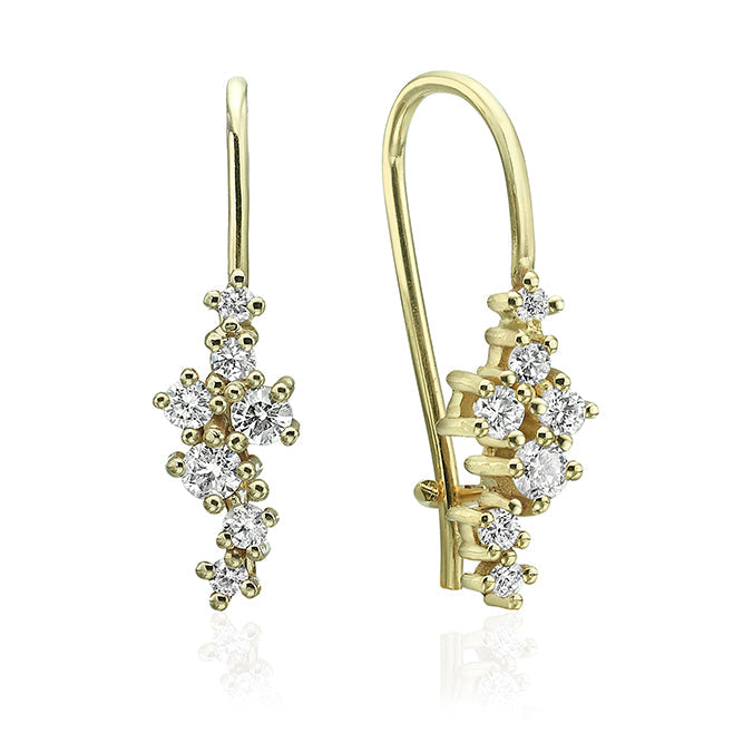 Hanging gold earrings studded with diamonds of varying sizes