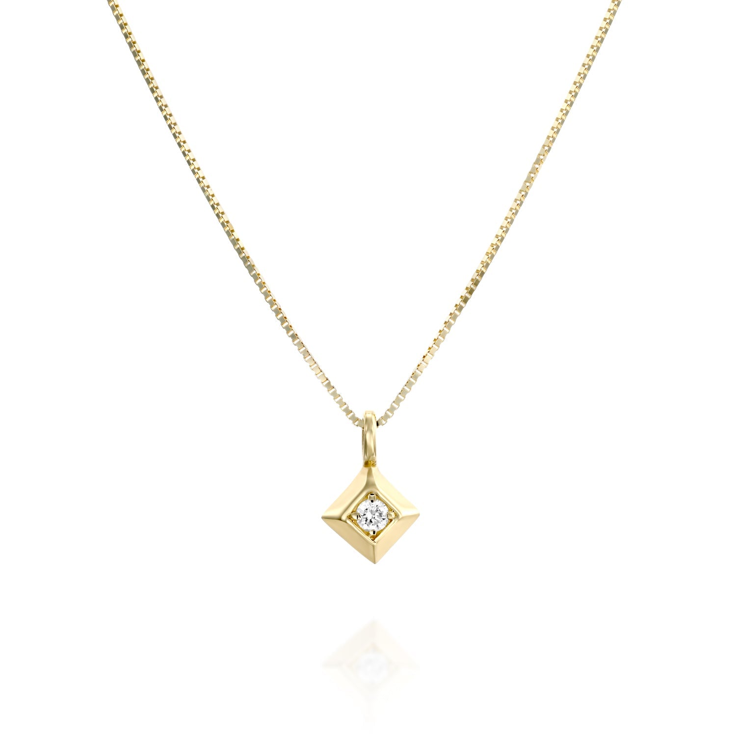 A delicate gold chain with a large square pendant and a 4-point diamond in the center