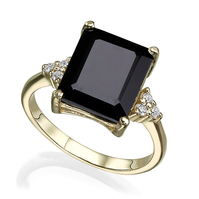 Engagement ring studded with rectangular black onyx and 6 sided diamonds
