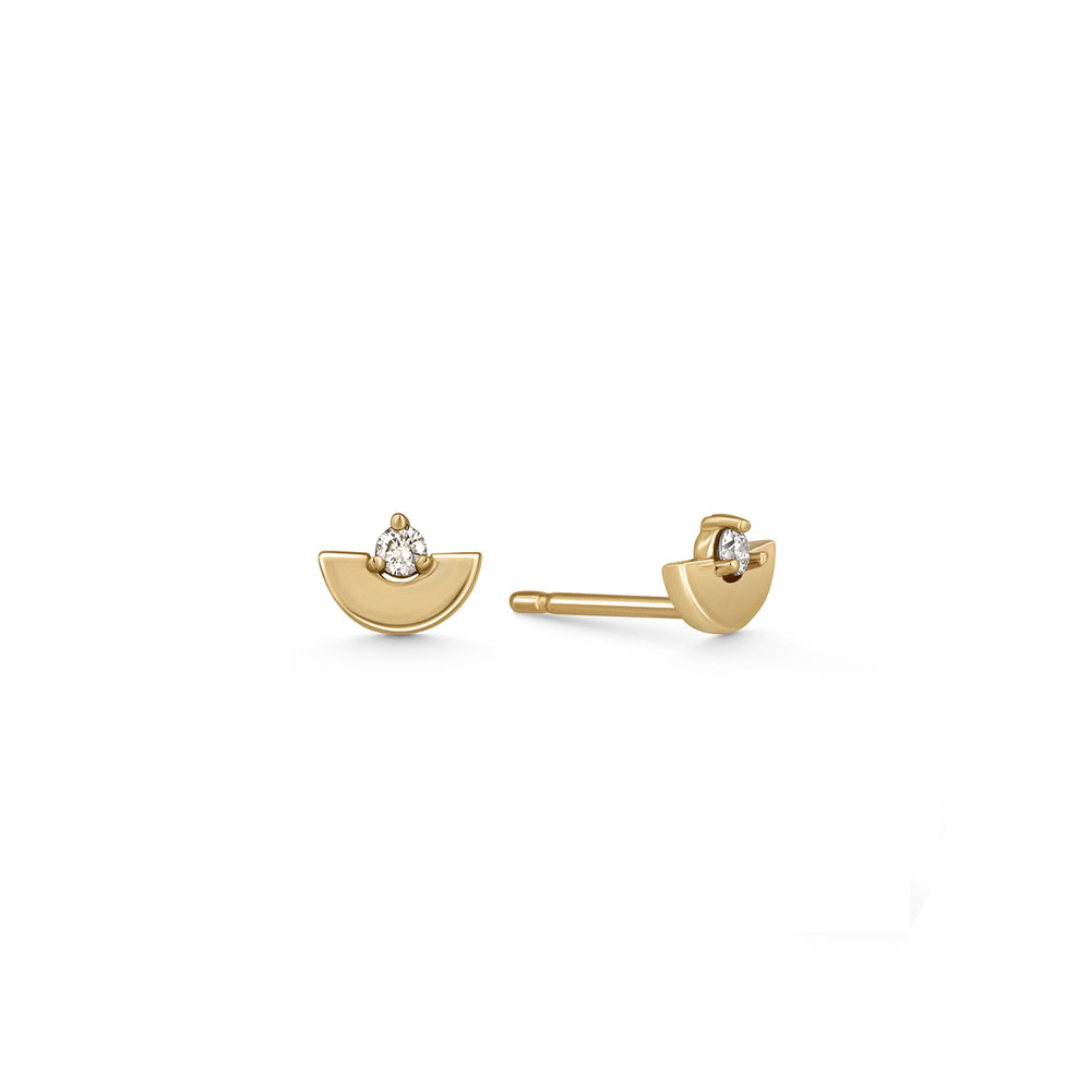Gold earrings, tight, small, in the shape of a semicircle, set with a diamond