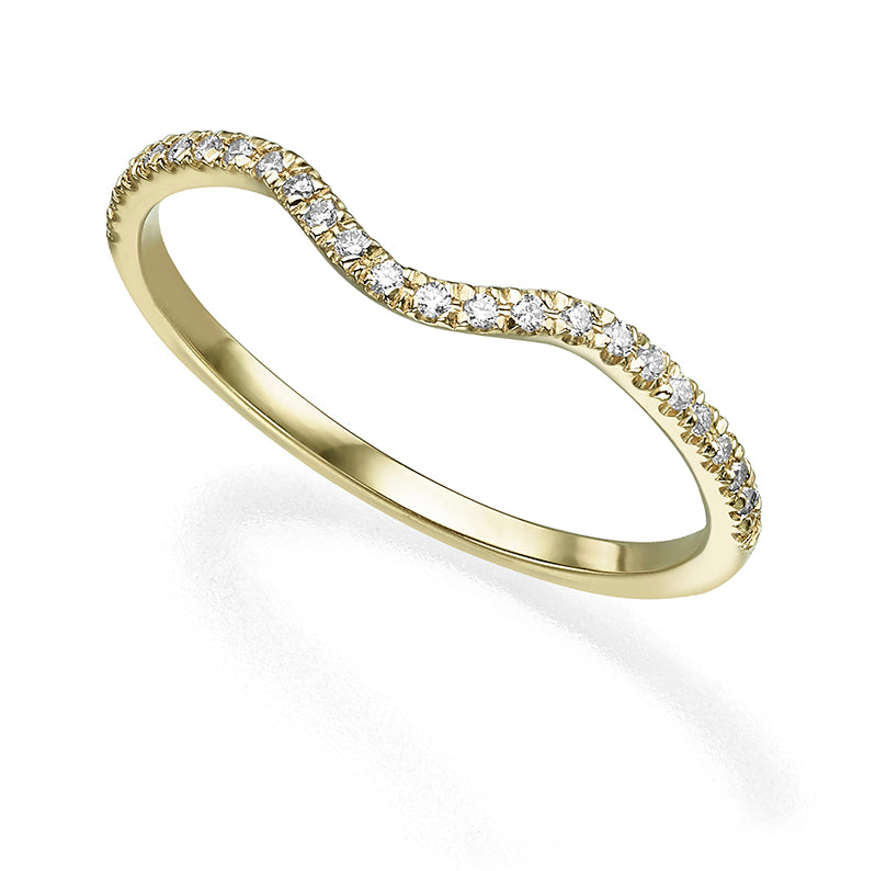 A gold ring with a wave set with diamonds
