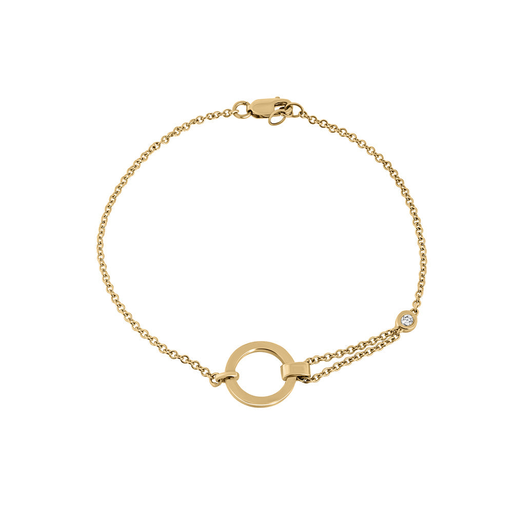A special asymmetric gold bracelet in a modern and impressive design set with a diamond