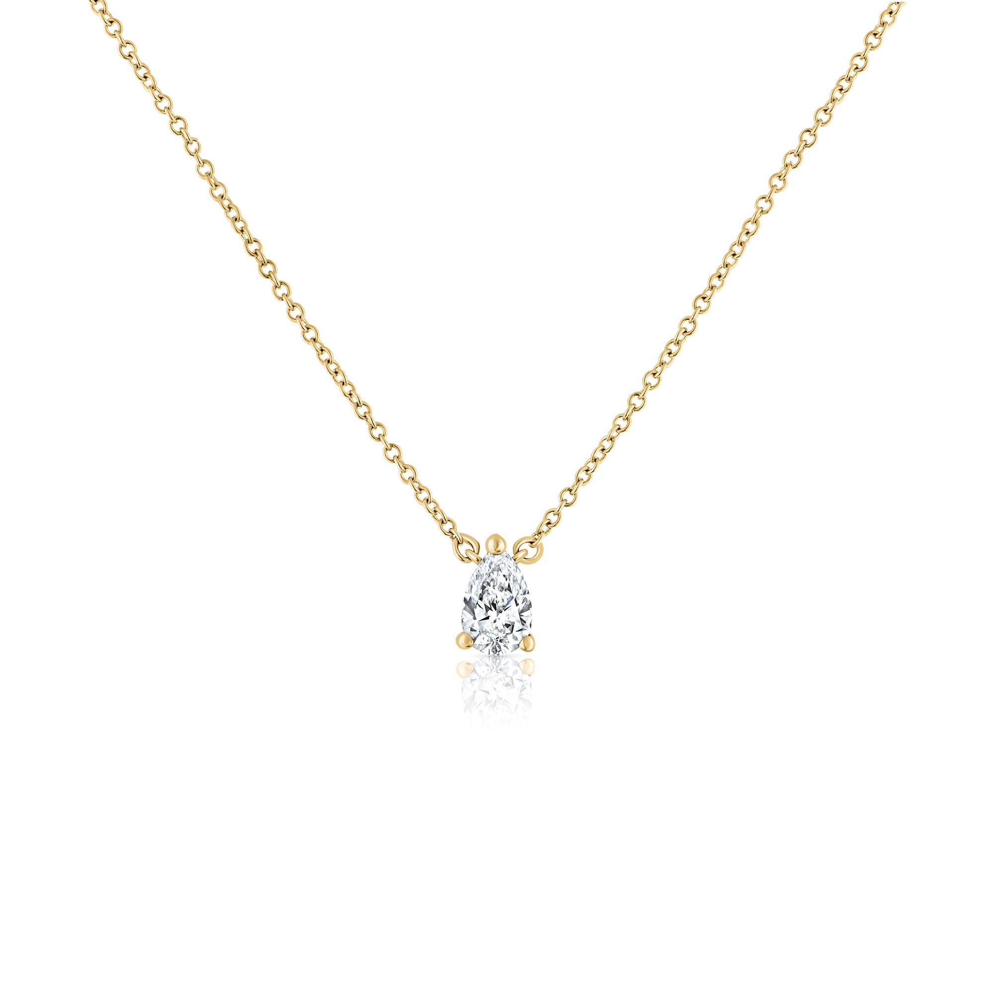 A classic gold chain set with a drop-cut lab diamond