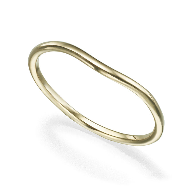 A gold ring with a gentle wave