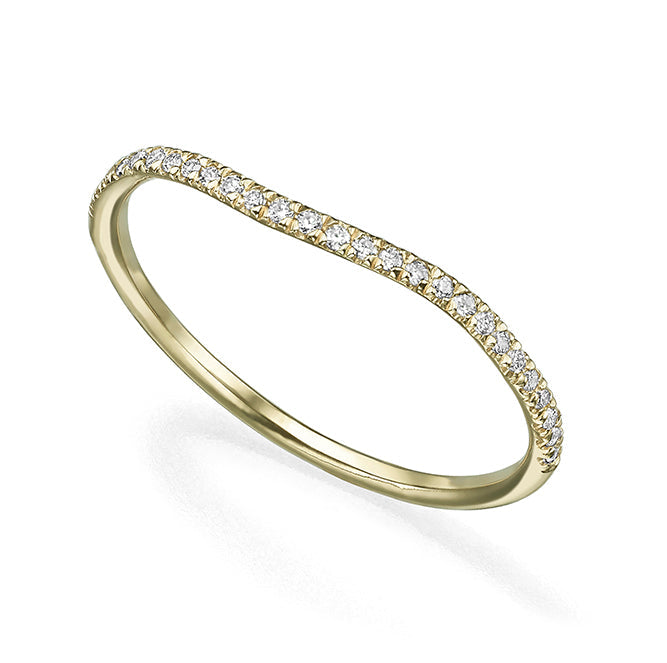 A gold ring with a fine wave set with diamonds