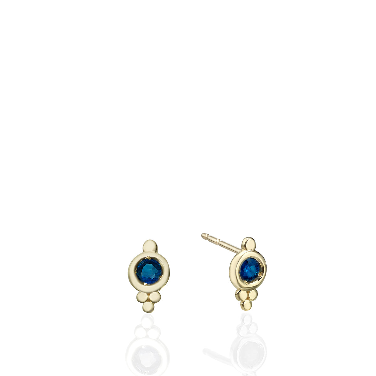 Indian style attached gold earrings studded with sapphires