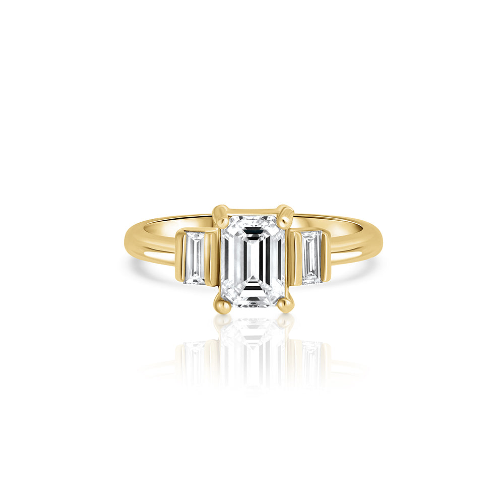 A modern gold engagement ring set with laboratory diamonds