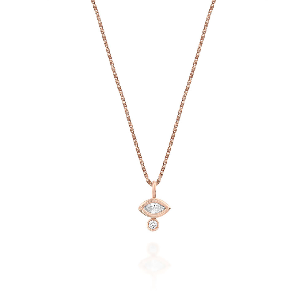 A fine gold chain with a diamond pendant in combination with a marquise-cut diamond (7 points) and a round diamond