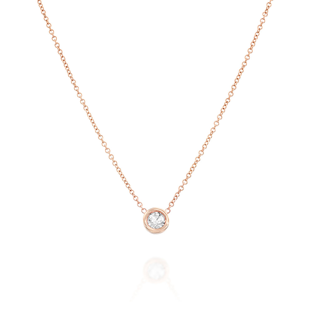 Gold necklace with a diamond pendant in a cup setting, attached to the chain on both sides, 0.15ct diamond
