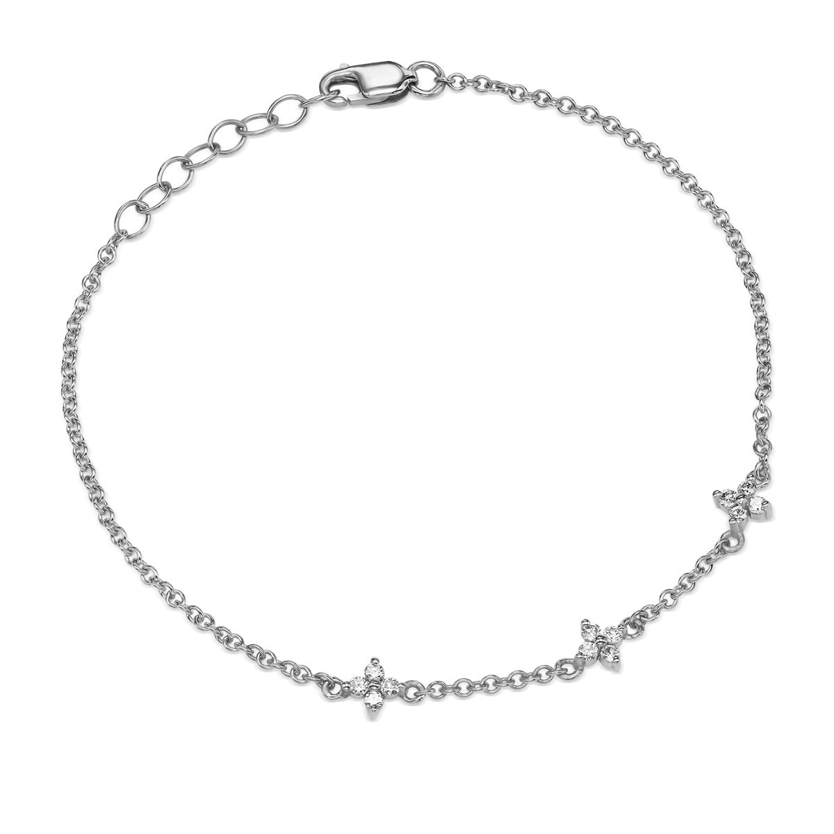 Gold bracelet decorated with 3 pendants in the shape of a flower and white diamonds