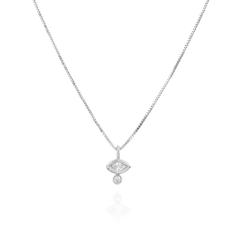 A fine gold chain with a diamond pendant in combination with a marquise-cut diamond (7 points) and a round diamond