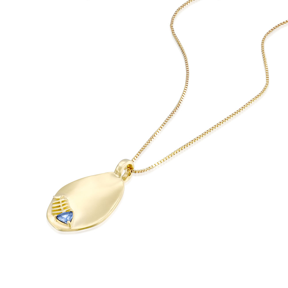 Gold necklace with an amorphous pendant decorated with a fish inlaid with a sapphire stone