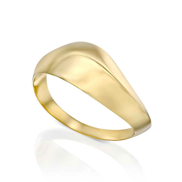 A wide geometric gold ring in a wave shape