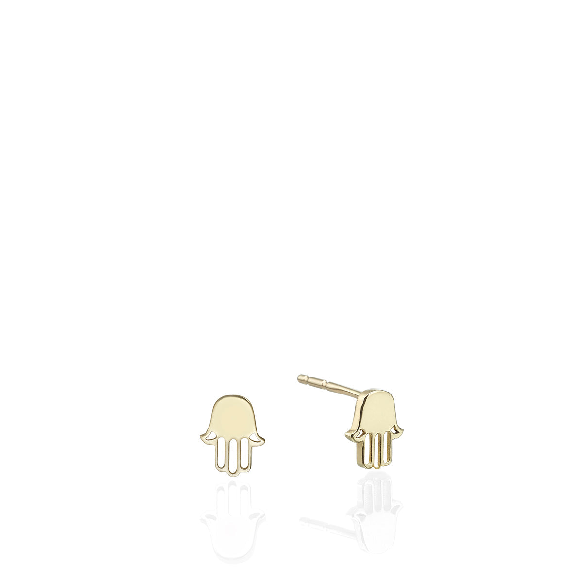 Gold Hamsa earrings close to the ear