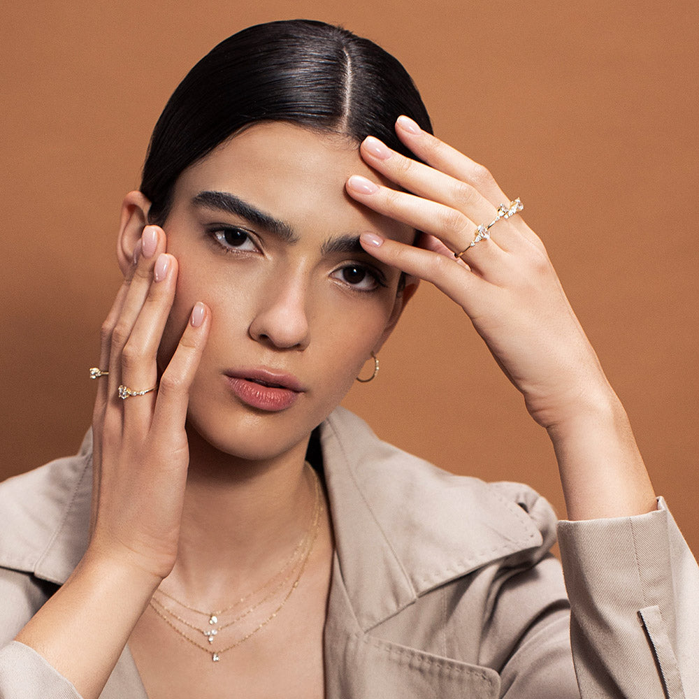 An impressive lab diamond ring with drop and marquise cuts