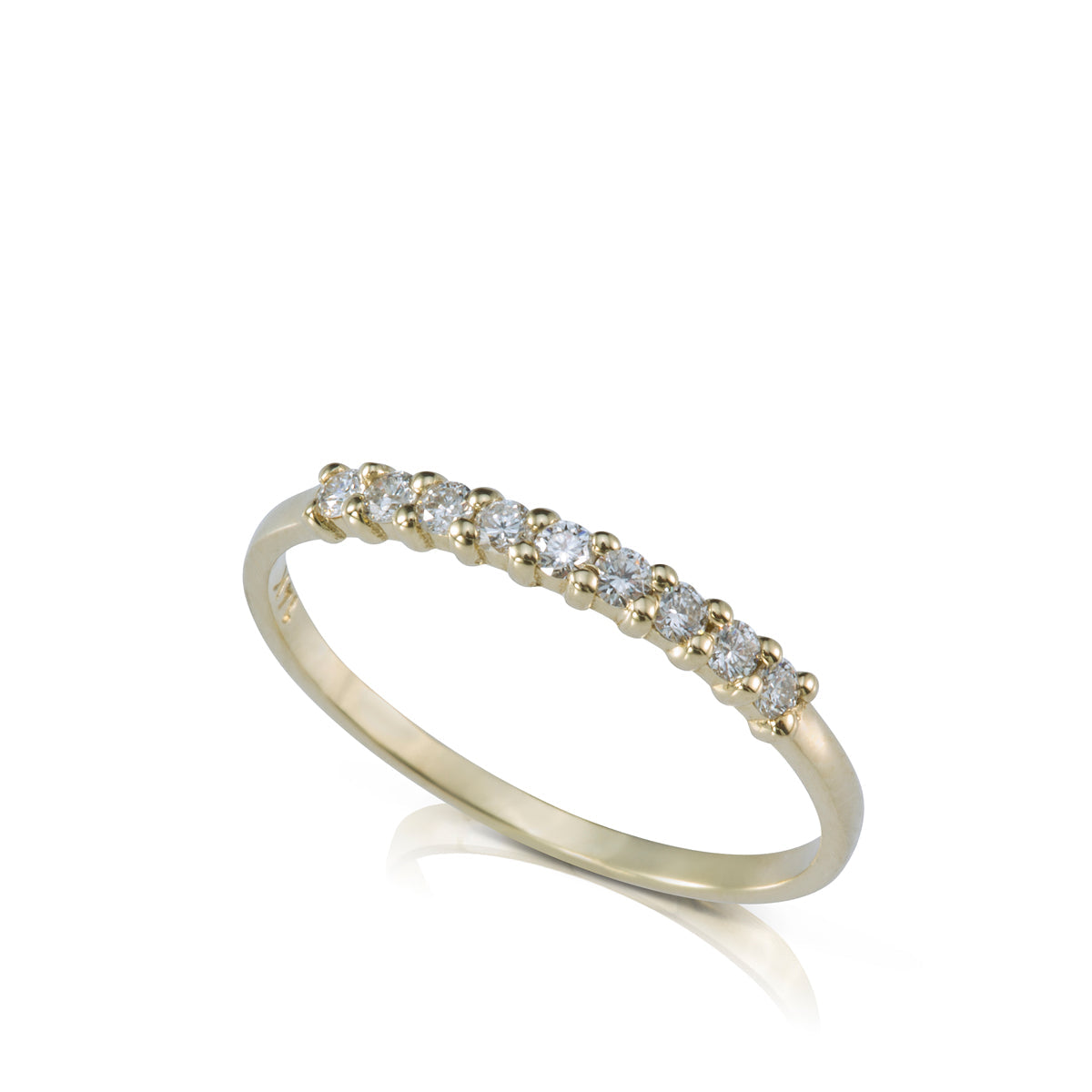 Ring with a row of diamonds in a prominent setting