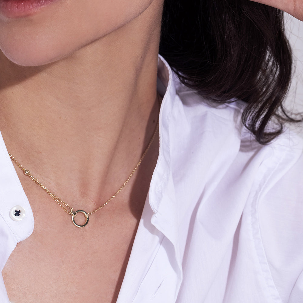A thick, asymmetric and special gold chain, with a modern and impressive design. Diamond encrusted