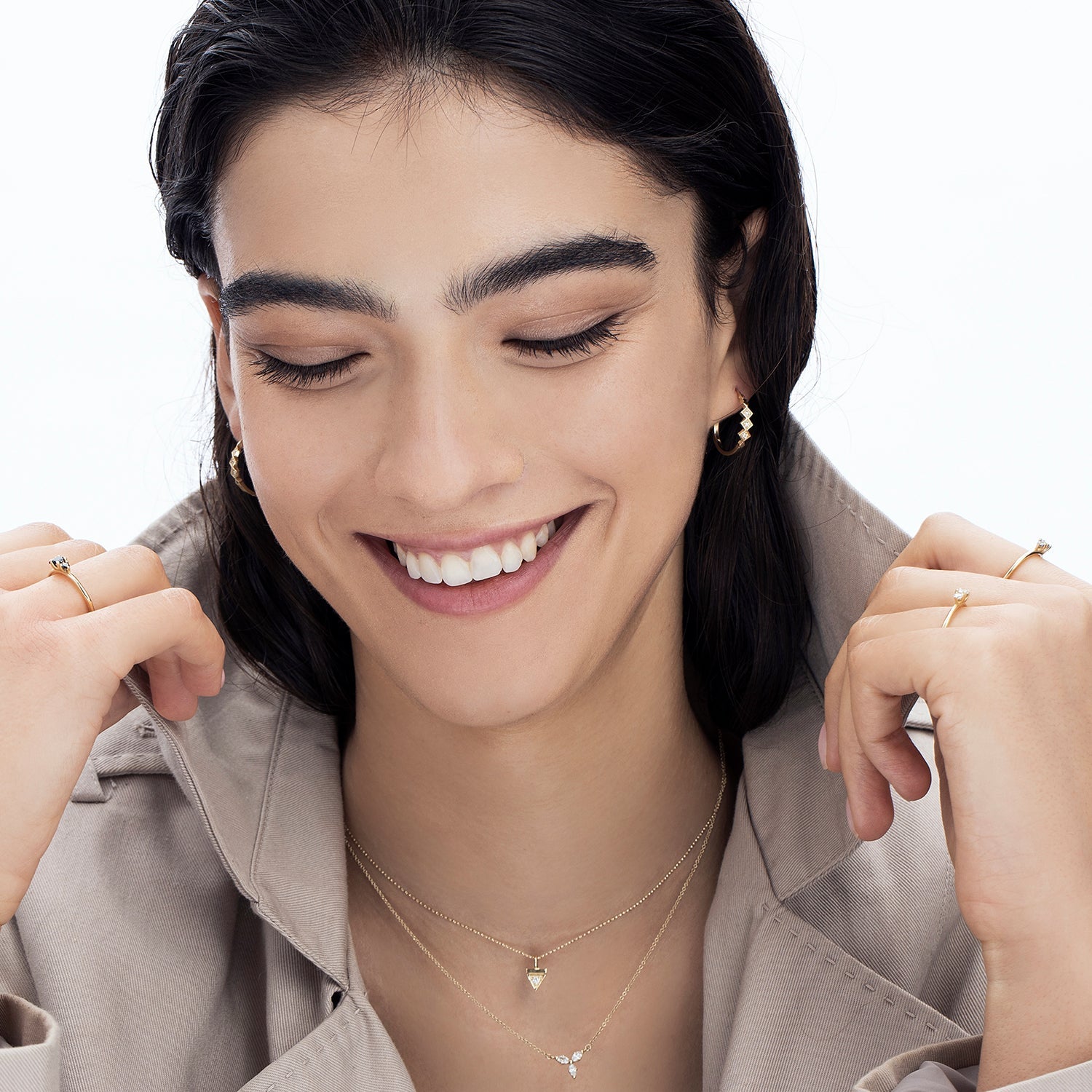 Fine gold chain with a triangle-shaped pendant studded with a 3-point diamond